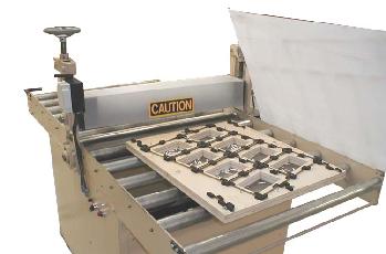 Roller die cutter for skin packaging